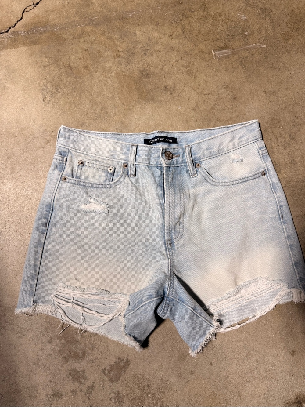 Calvin Klein distressed Jean shorts size 4